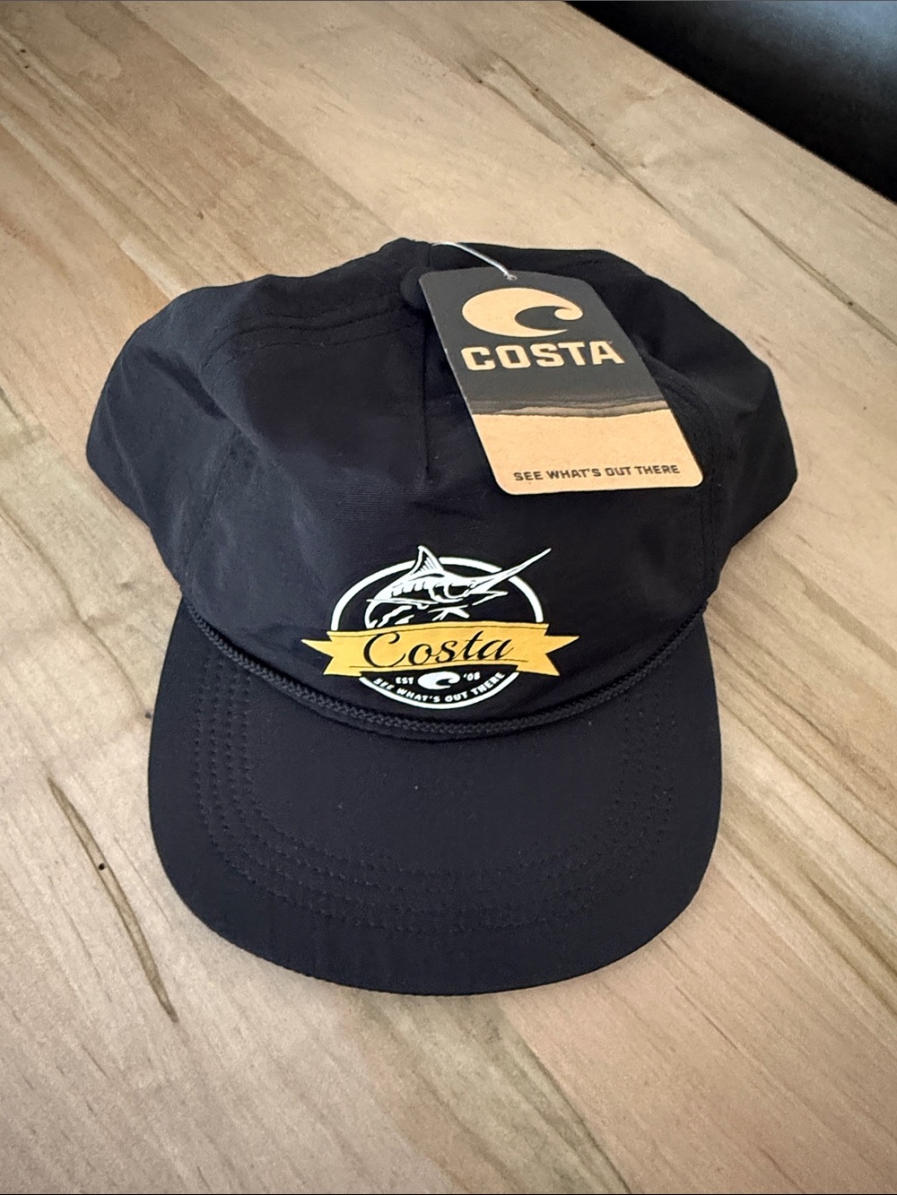 Costa Black Cap with Yellow Marlin Emblem